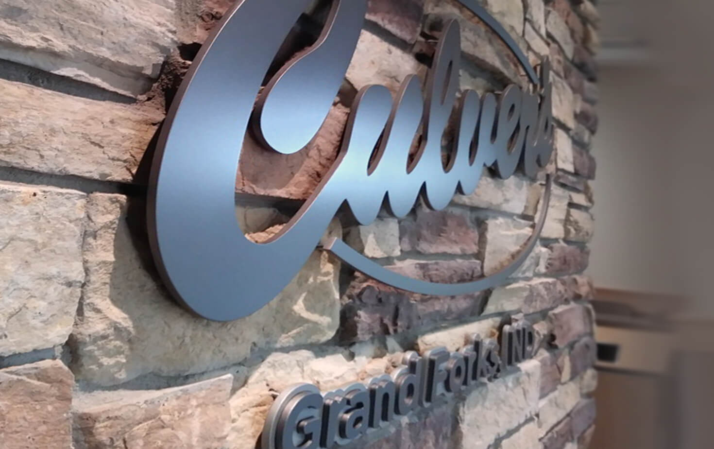 Culver's Grand Forks ND Interior Logo on Brick Wall