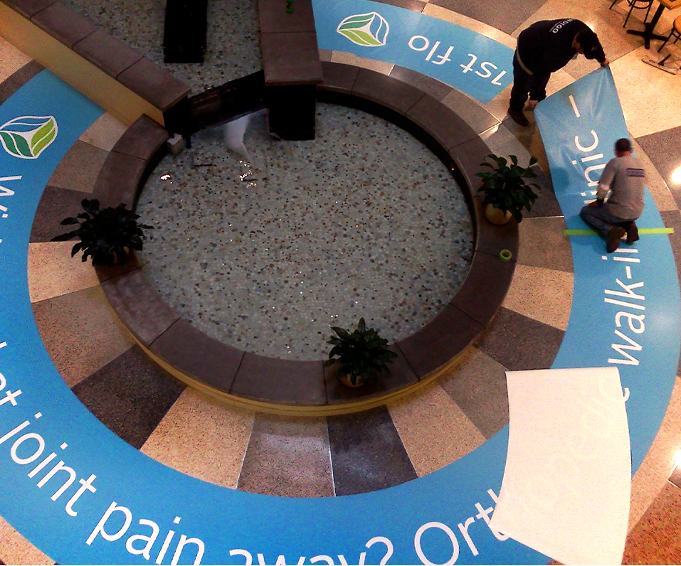 Essentia Health Floor Graphics Installation Around Water Feature