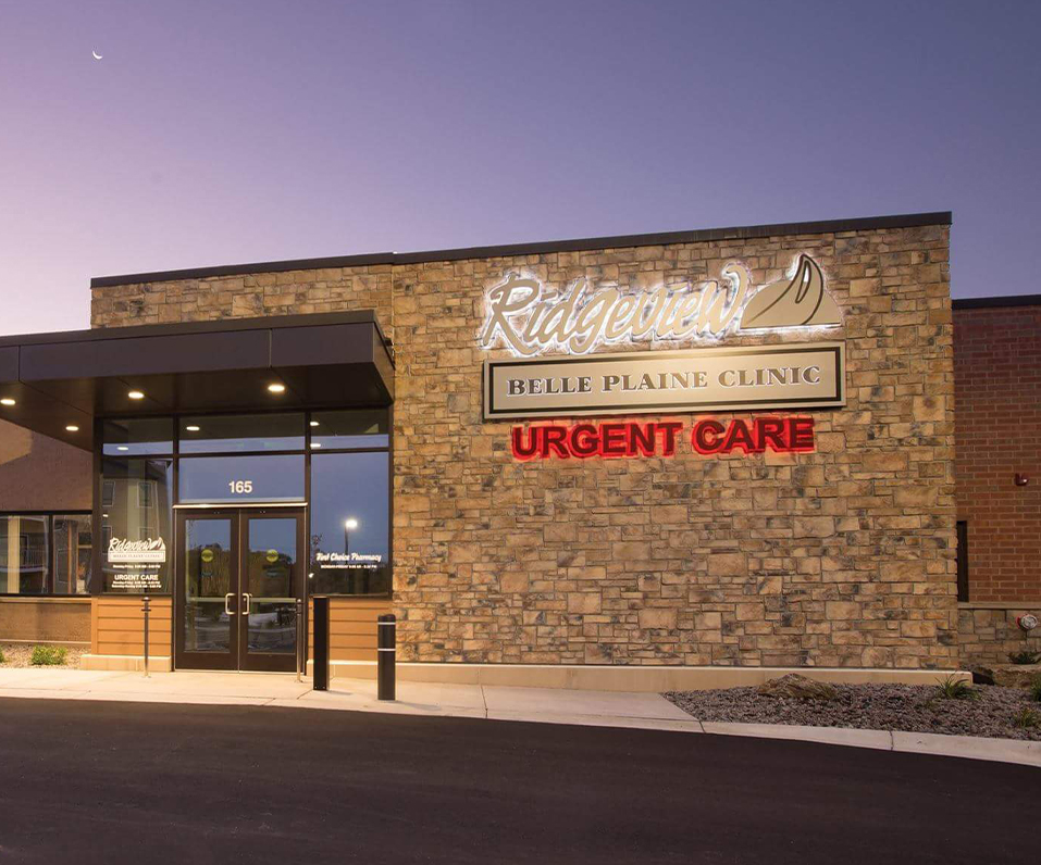 Ridgeview Belle Plaine Clinic Urgent Care Building Signage Illuminated at Night Halo Lit